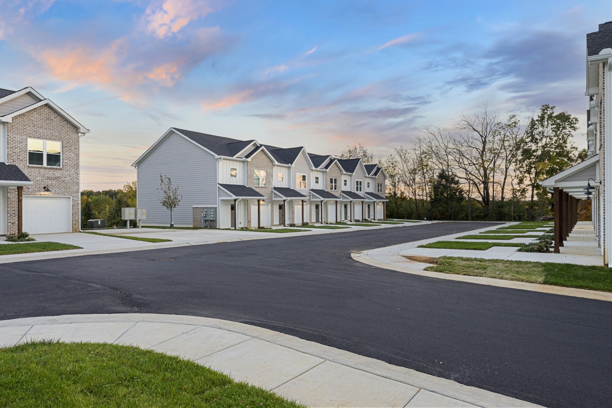 2624 South Main Street, Unit 7 Springfield, TN 37172 - Photo 9 of 37 a view of a house with a big yard and large trees