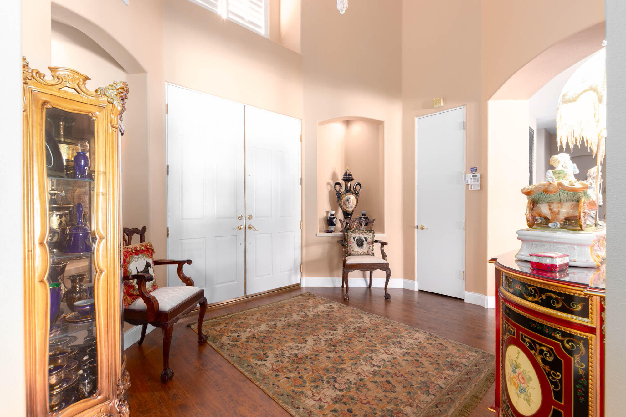 4 Bentley Road Rancho Mirage, CA 92270 - Photo 3 of 13 a living room with furniture and a window