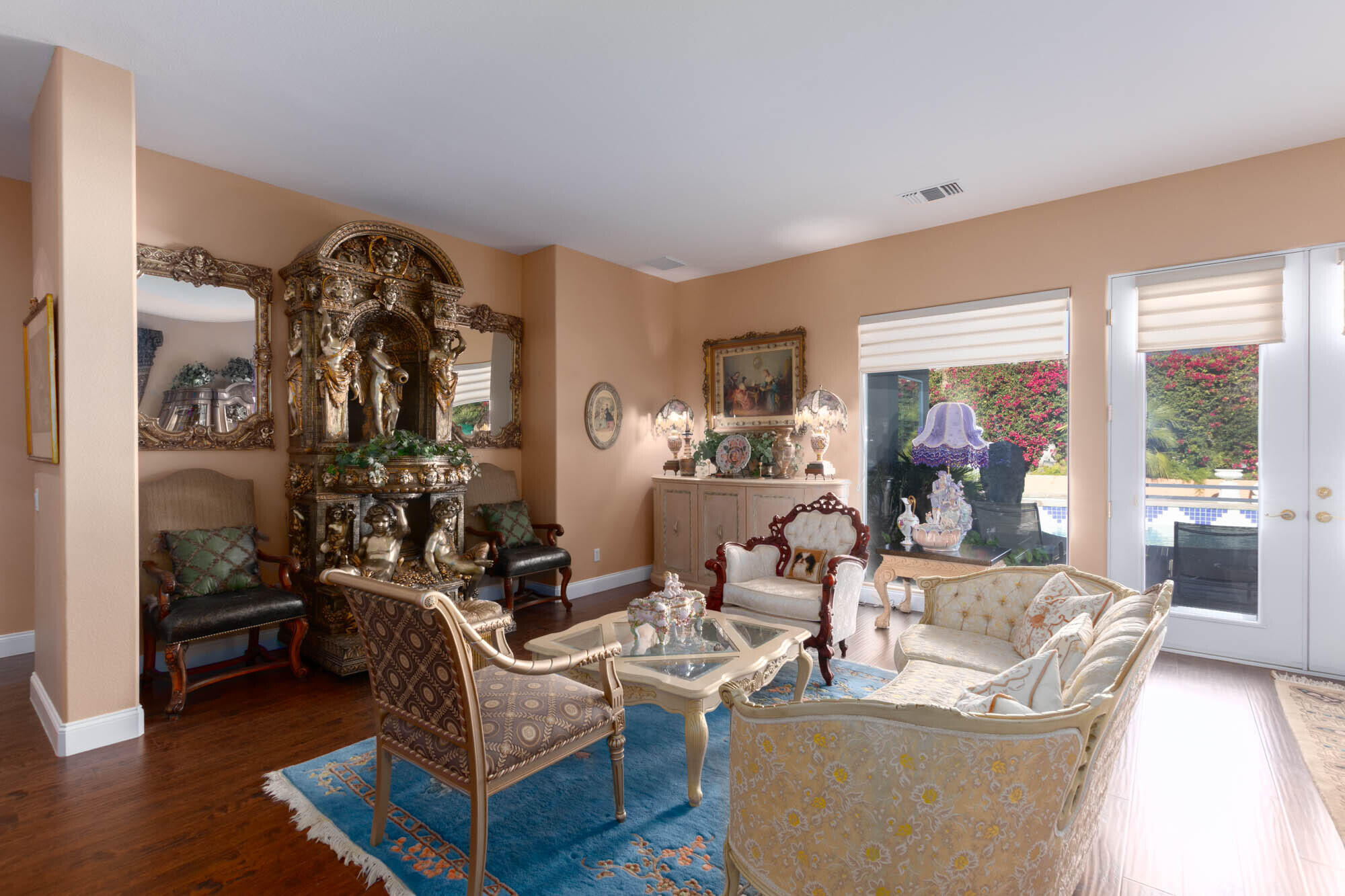 4 Bentley Road Rancho Mirage, CA 92270 - Photo 4 of 13 a living room with furniture and a large window