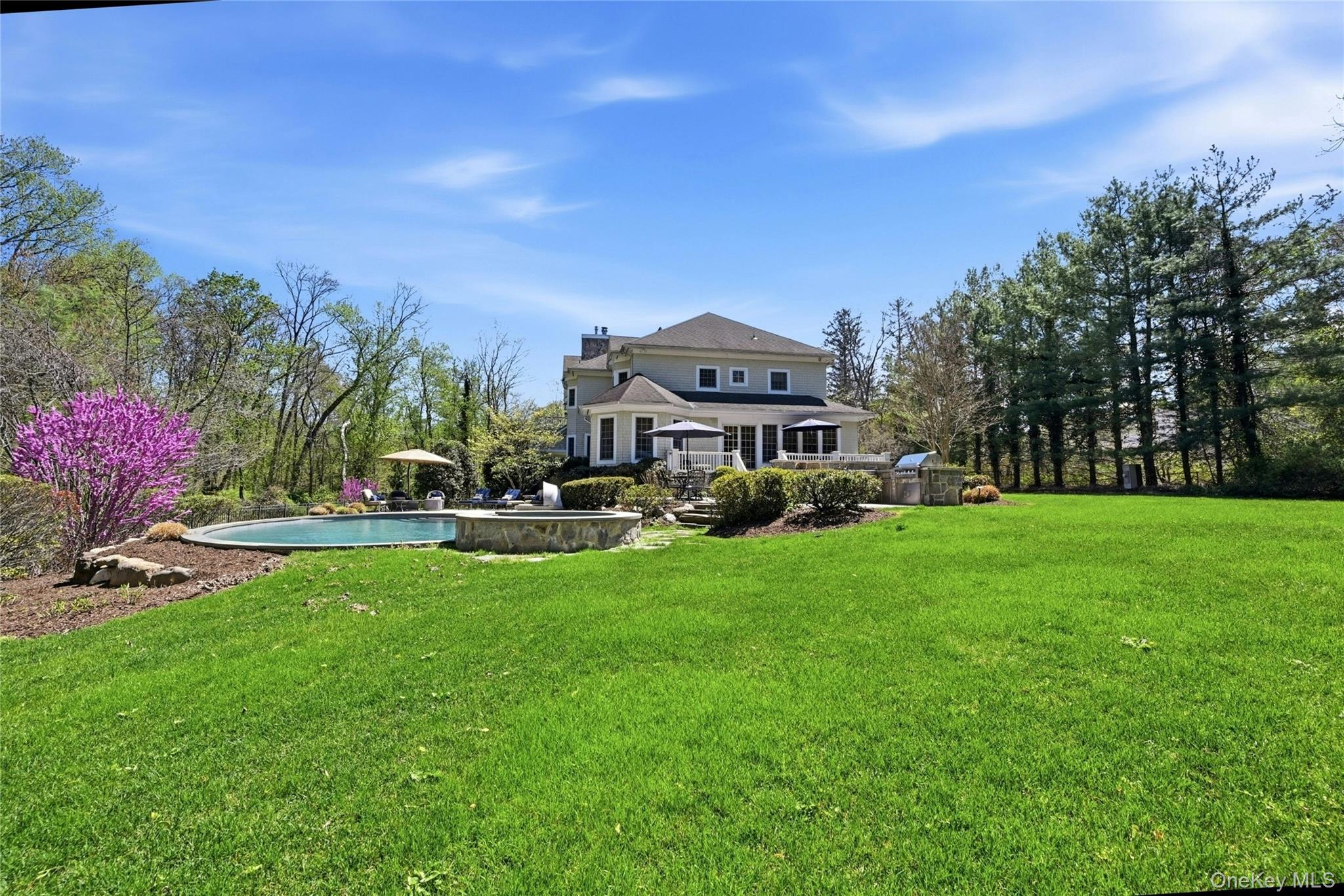 5 Mill Road Lloyd Harbor, NY 11743 - Photo 5 of 49 a view of a garden with a house