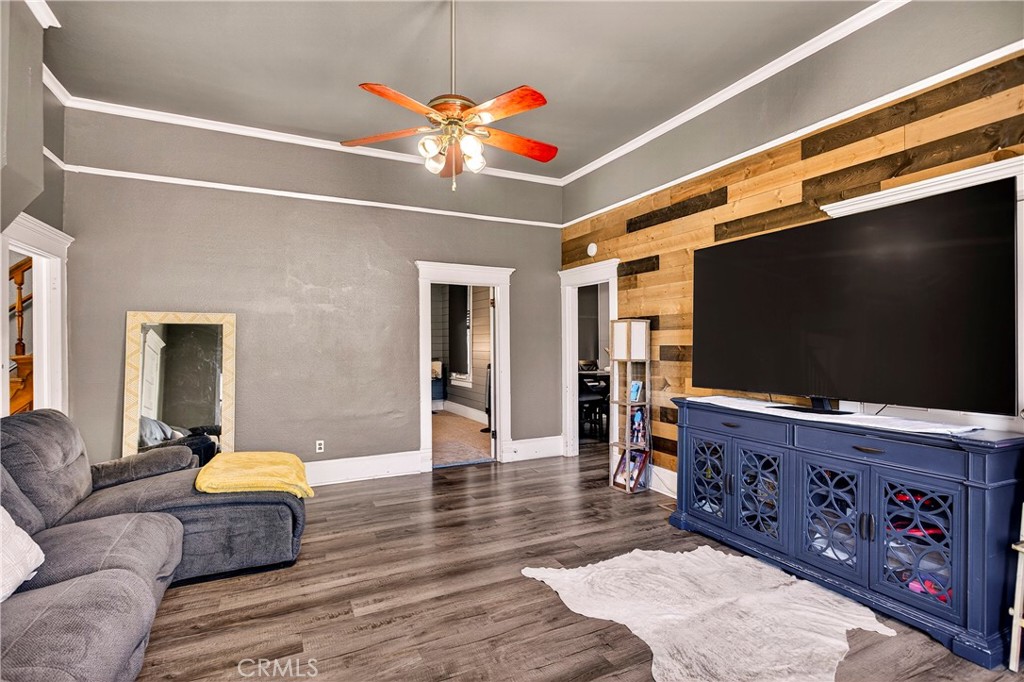 1214 Marin Street Corning, CA 96021 - Photo 11 of 57 a living room with furniture and a flat screen tv