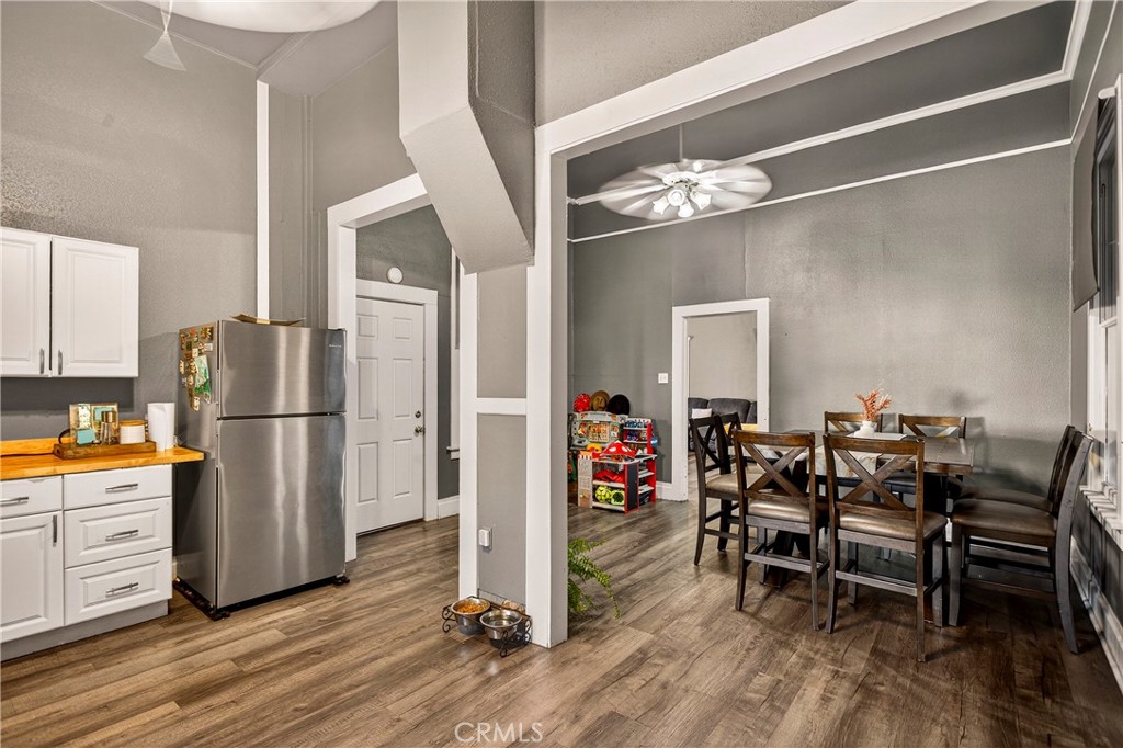 1214 Marin Street Corning, CA 96021 - Photo 15 of 57 a view of a dining room with furniture and a chandelier