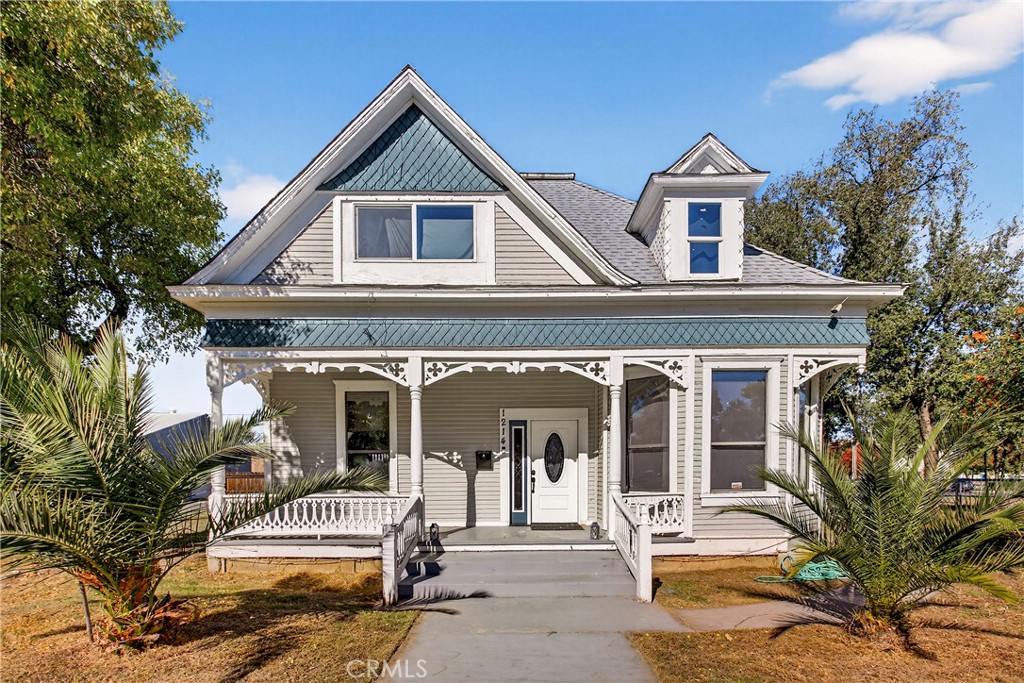 1214 Marin Street Corning, CA 96021 - Photo 2 of 57 a front view of a house with a yard