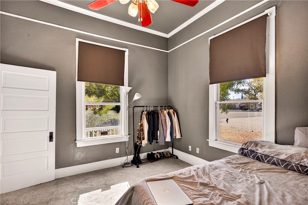 1214 Marin Street Corning, CA 96021 - Photo 24 of 57 a bedroom with a bed and a window