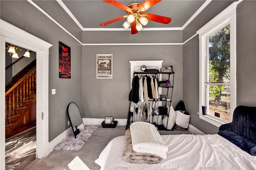 1214 Marin Street Corning, CA 96021 - Photo 25 of 57 a living room with furniture a window and a flat screen tv