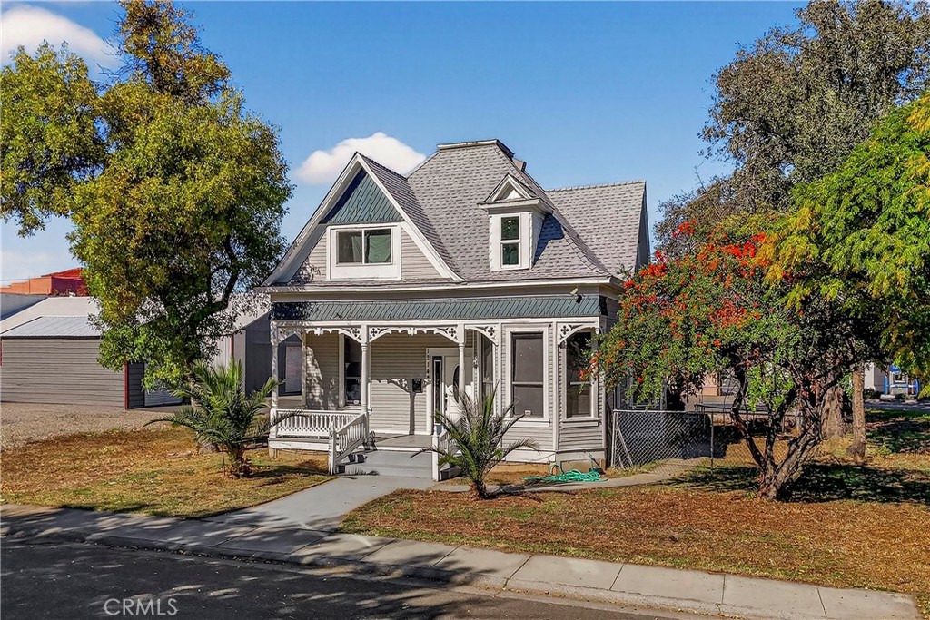 1214 Marin Street Corning, CA 96021 - Photo 3 of 57 a front view of a house with parking area