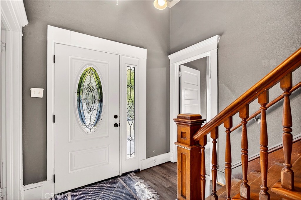 1214 Marin Street Corning, CA 96021 - Photo 7 of 57 a view of a hallway with wooden floor and entryway