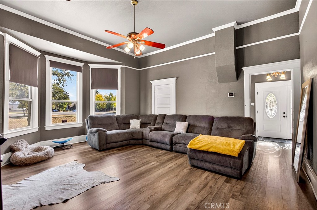 1214 Marin Street Corning, CA 96021 - Photo 9 of 57 a living room with furniture and a large window