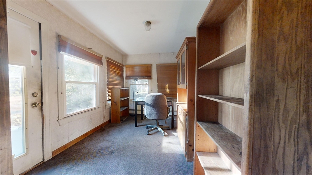 57 Church Street Watertown, MA 02472 - Photo 9 of 18 a view of a livingroom with outdoor space and furniture