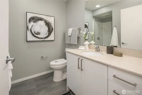 a bathroom with a toilet and a sink