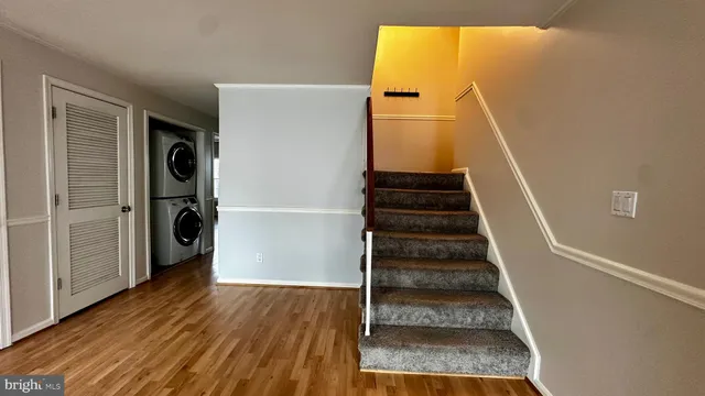 a view of entryway with wooden floor