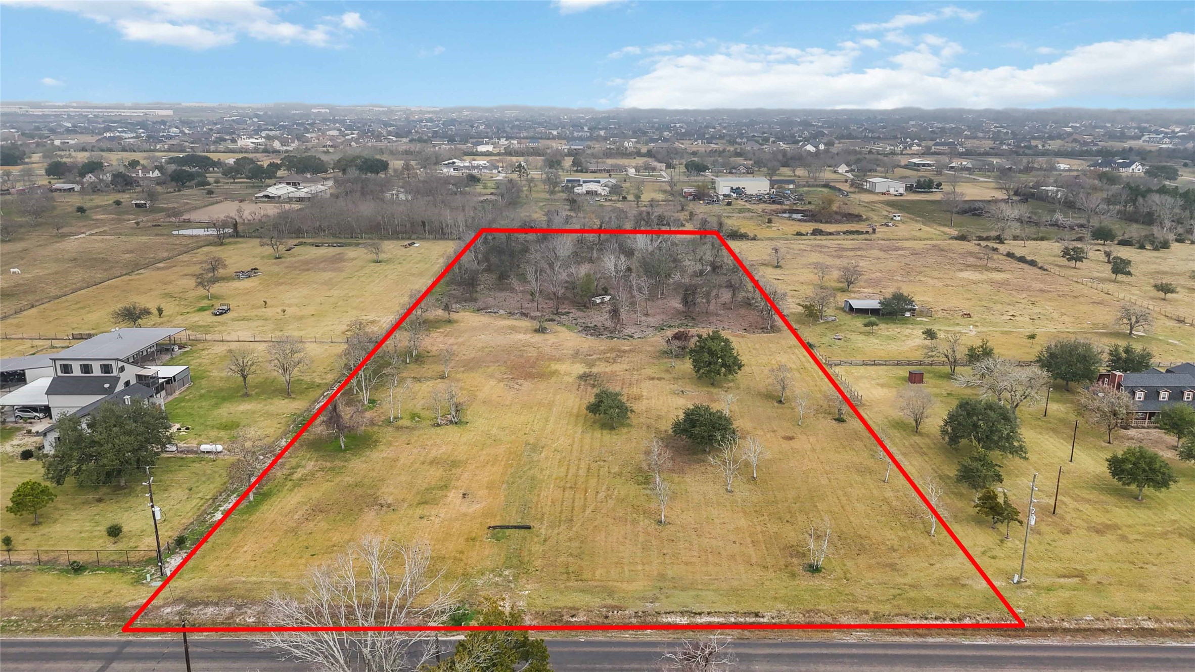 0 Lawrence Road Baytown, TX 77523 - Photo 2 of 12 an aerial view of residential houses with outdoor space