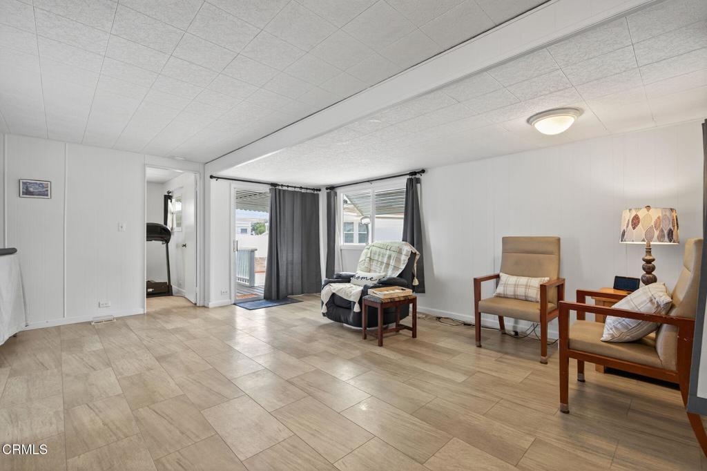 4032 Mockingbird Lane, Unit 4032 Oxnard, CA 93033 - Photo 13 of 36 a living room with furniture