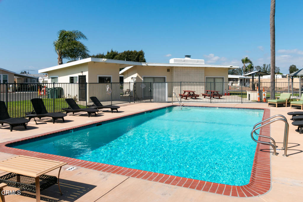4032 Mockingbird Lane, Unit 4032 Oxnard, CA 93033 - Photo 34 of 36 a view of a house with swimming pool and sitting area