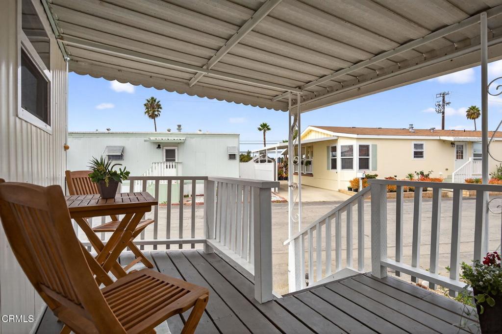 4032 Mockingbird Lane, Unit 4032 Oxnard, CA 93033 - Photo 6 of 36 a view of a patio with wooden floor