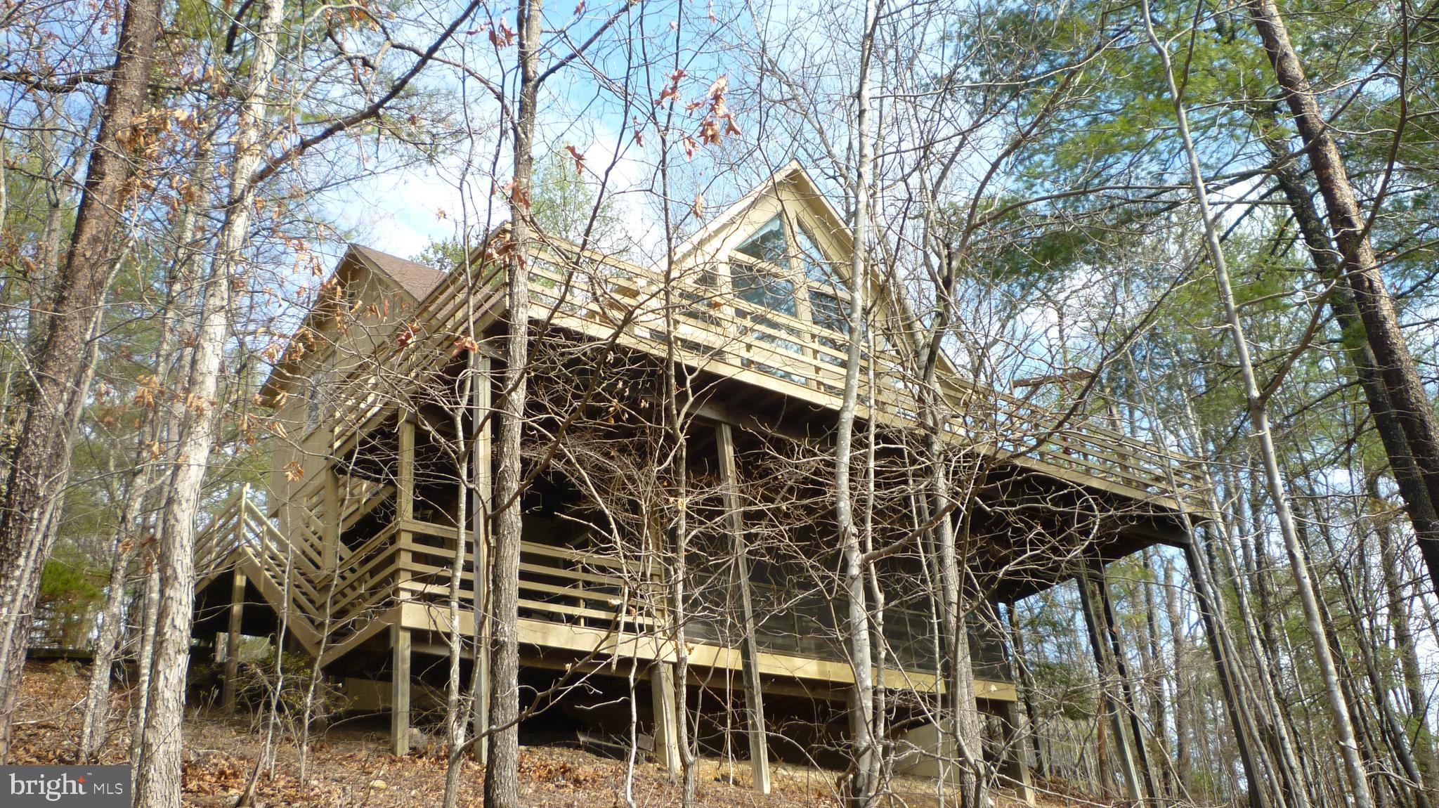 51 Forrest Street Basye, VA 22810 - Photo 1 of 27 front view of a house with a trees