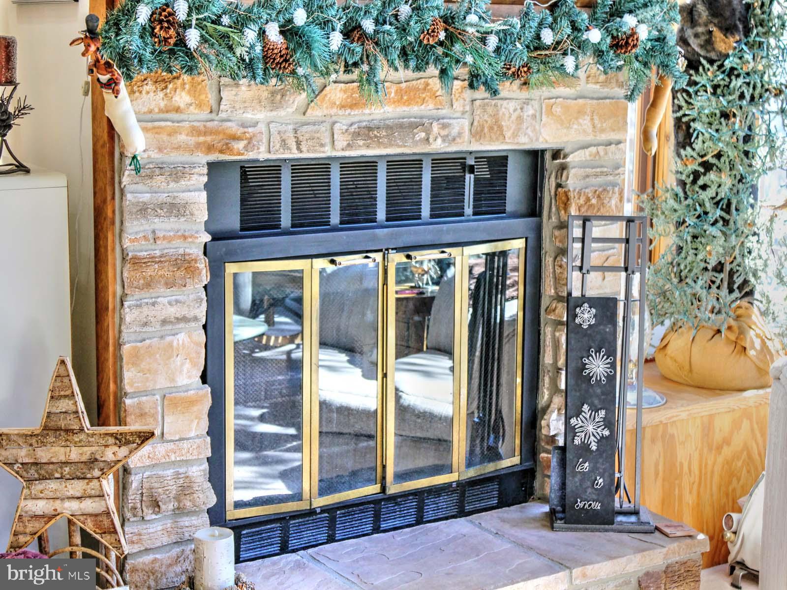 51 Forrest Street Basye, VA 22810 - Photo 12 of 27 a view of a brick house with large windows