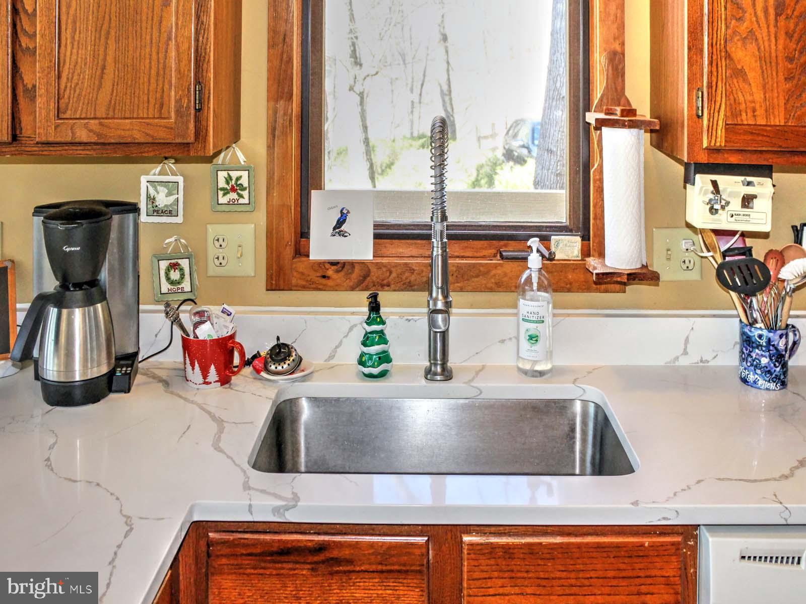 51 Forrest Street Basye, VA 22810 - Photo 15 of 27 a kitchen with a sink and a window