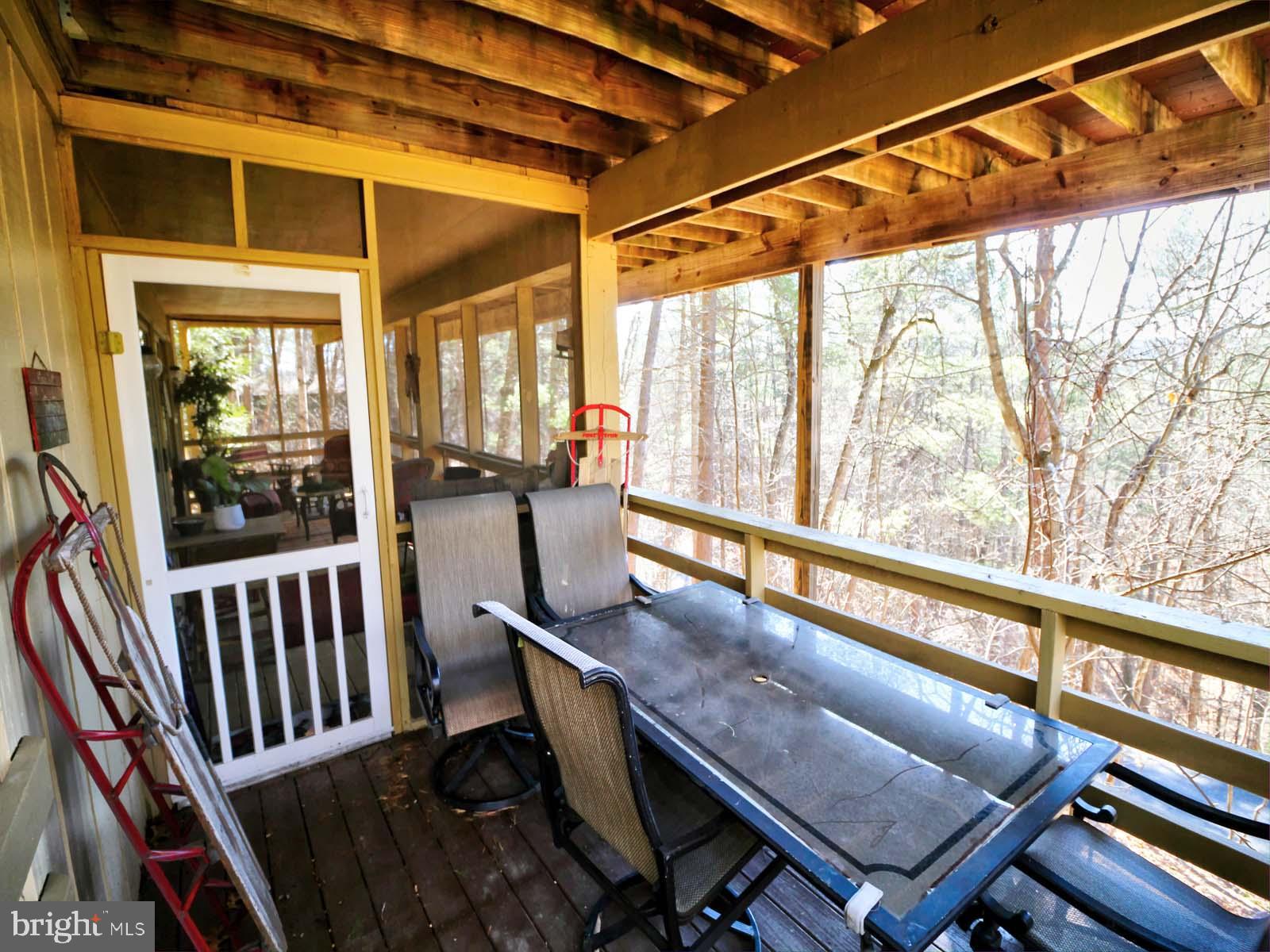 51 Forrest Street Basye, VA 22810 - Photo 25 of 27 a view of a living room with furniture and wooden floor