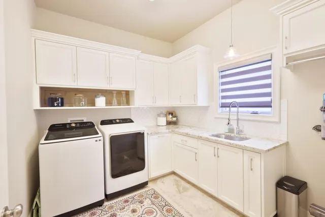a spacious bedroom with a bed and a ceiling fan