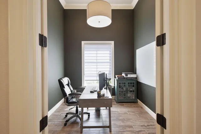 a bathroom with a sink vanity and a mirror
