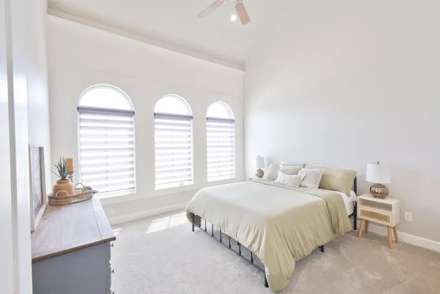 a bathroom with a sink a mirror and shower