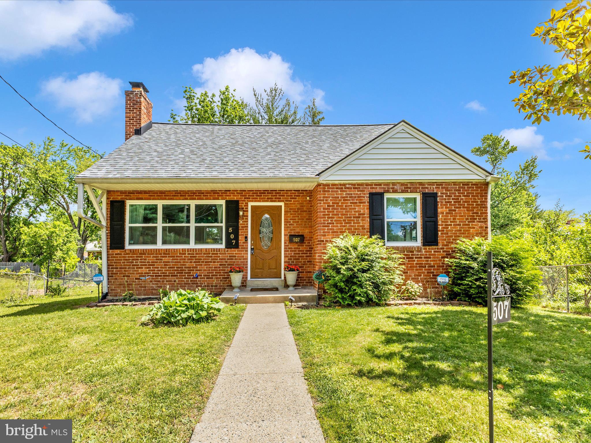 507 Kerwin Court Silver Spring, MD 20901 - Photo 1 of 51 a front view of a house with garden