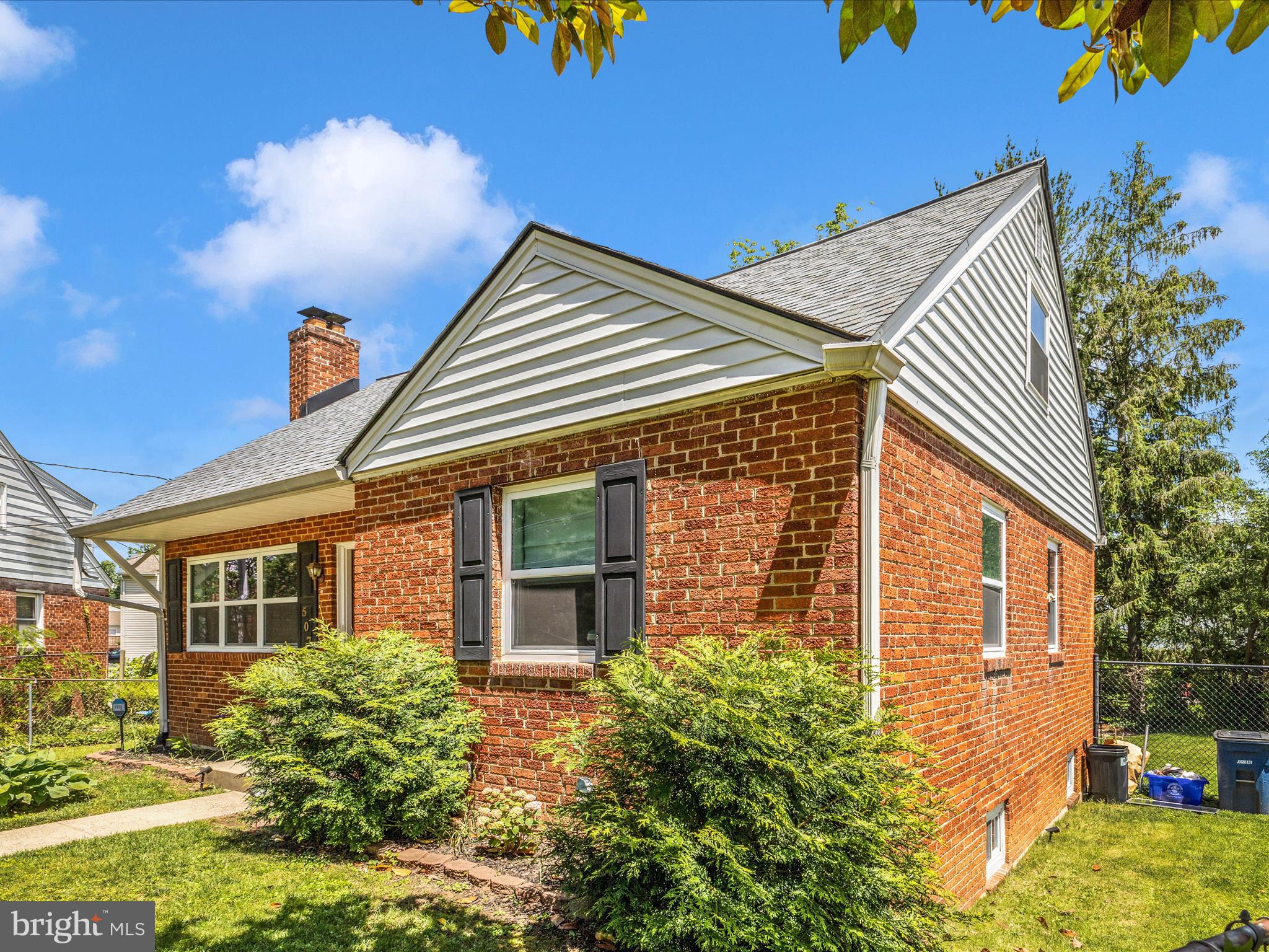 507 Kerwin Court Silver Spring, MD 20901 - Photo 2 of 51 a front view of a house with garden