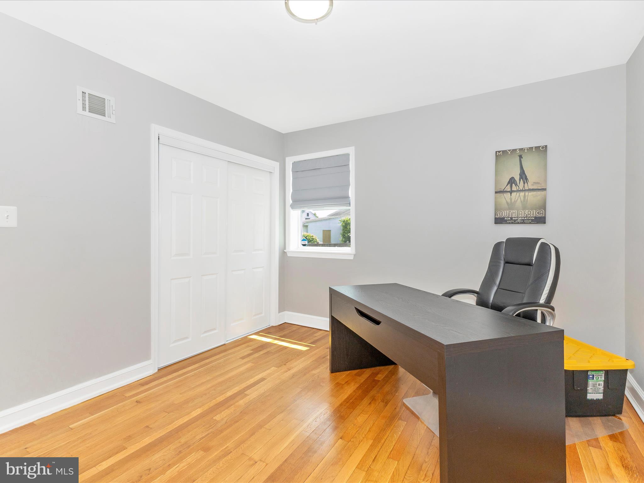 507 Kerwin Court Silver Spring, MD 20901 - Photo 22 of 51 a view of a workspace with furniture and a window