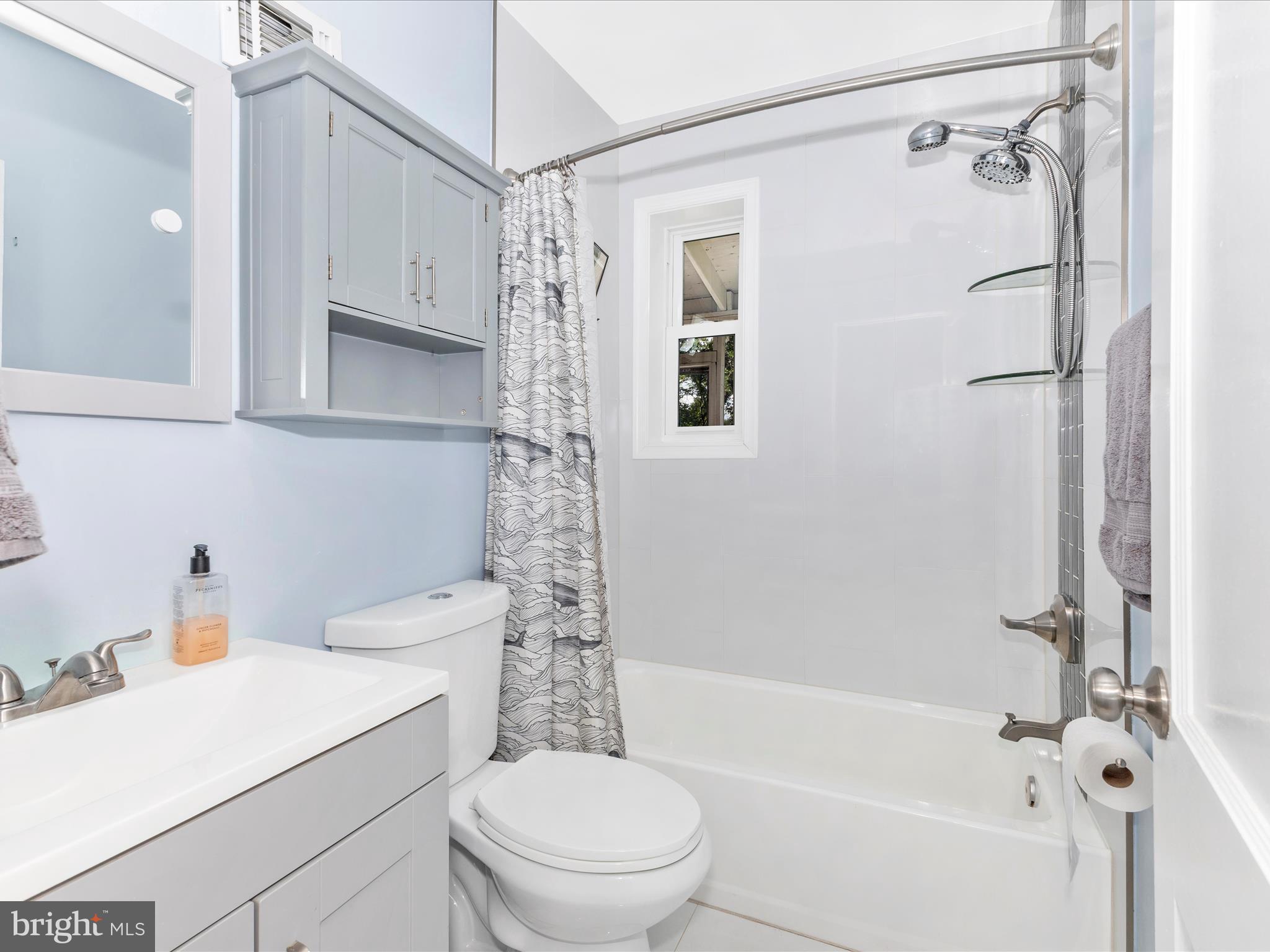 507 Kerwin Court Silver Spring, MD 20901 - Photo 26 of 51 a bathroom with a sink a toilet and shower