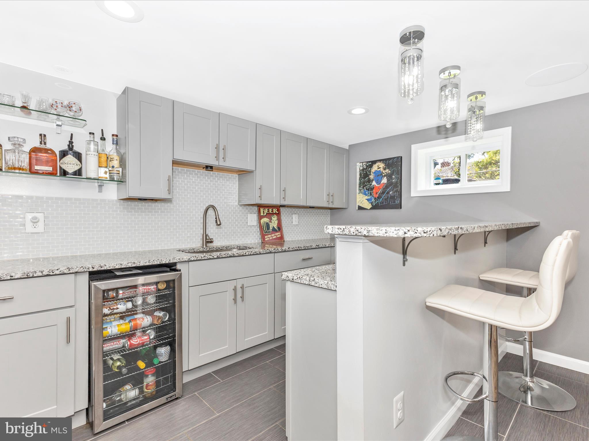 507 Kerwin Court Silver Spring, MD 20901 - Photo 33 of 51 a kitchen with stainless steel appliances granite countertop a sink a stove a refrigerator and a stove