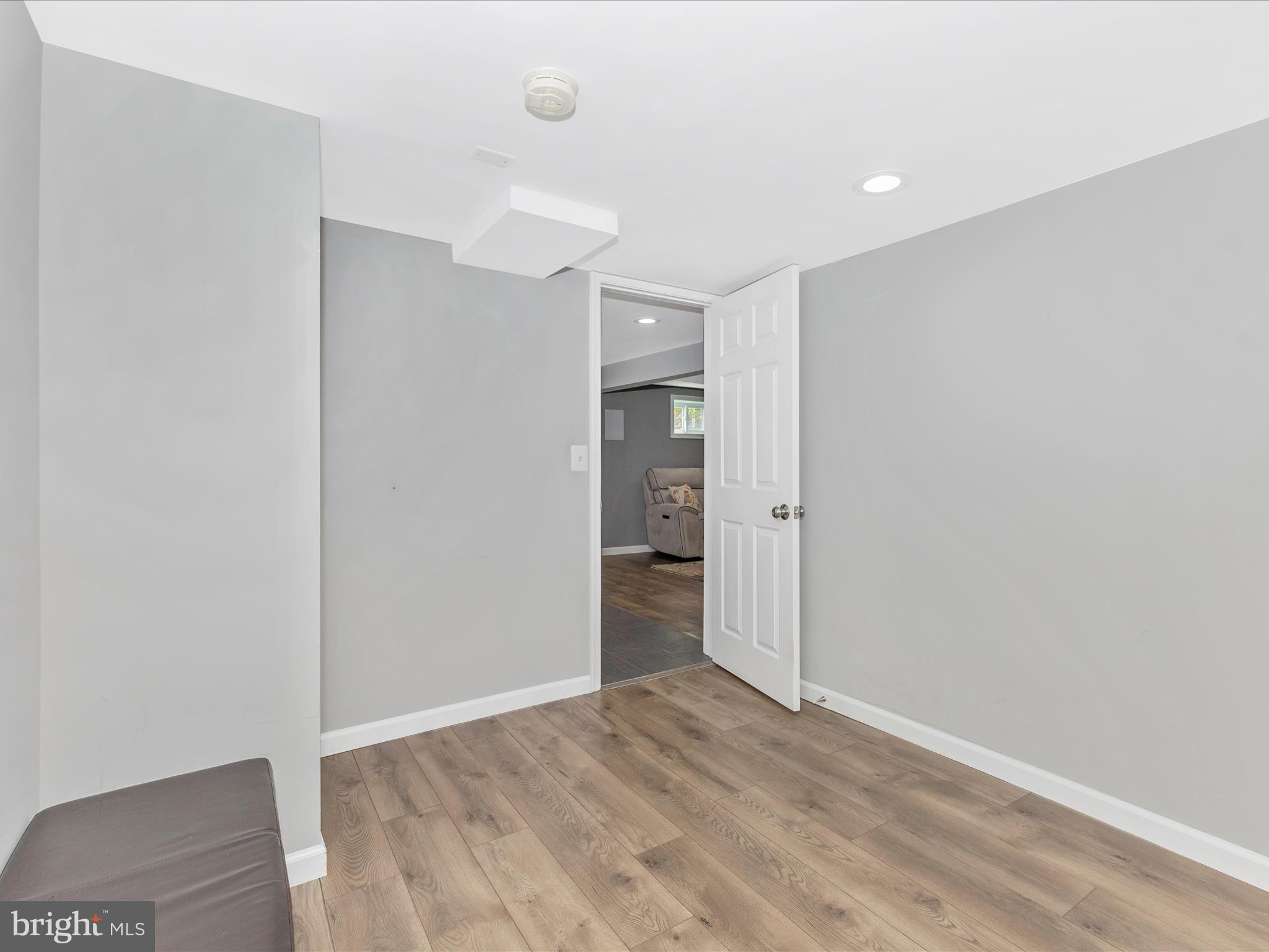507 Kerwin Court Silver Spring, MD 20901 - Photo 35 of 51 wooden floor in an empty room