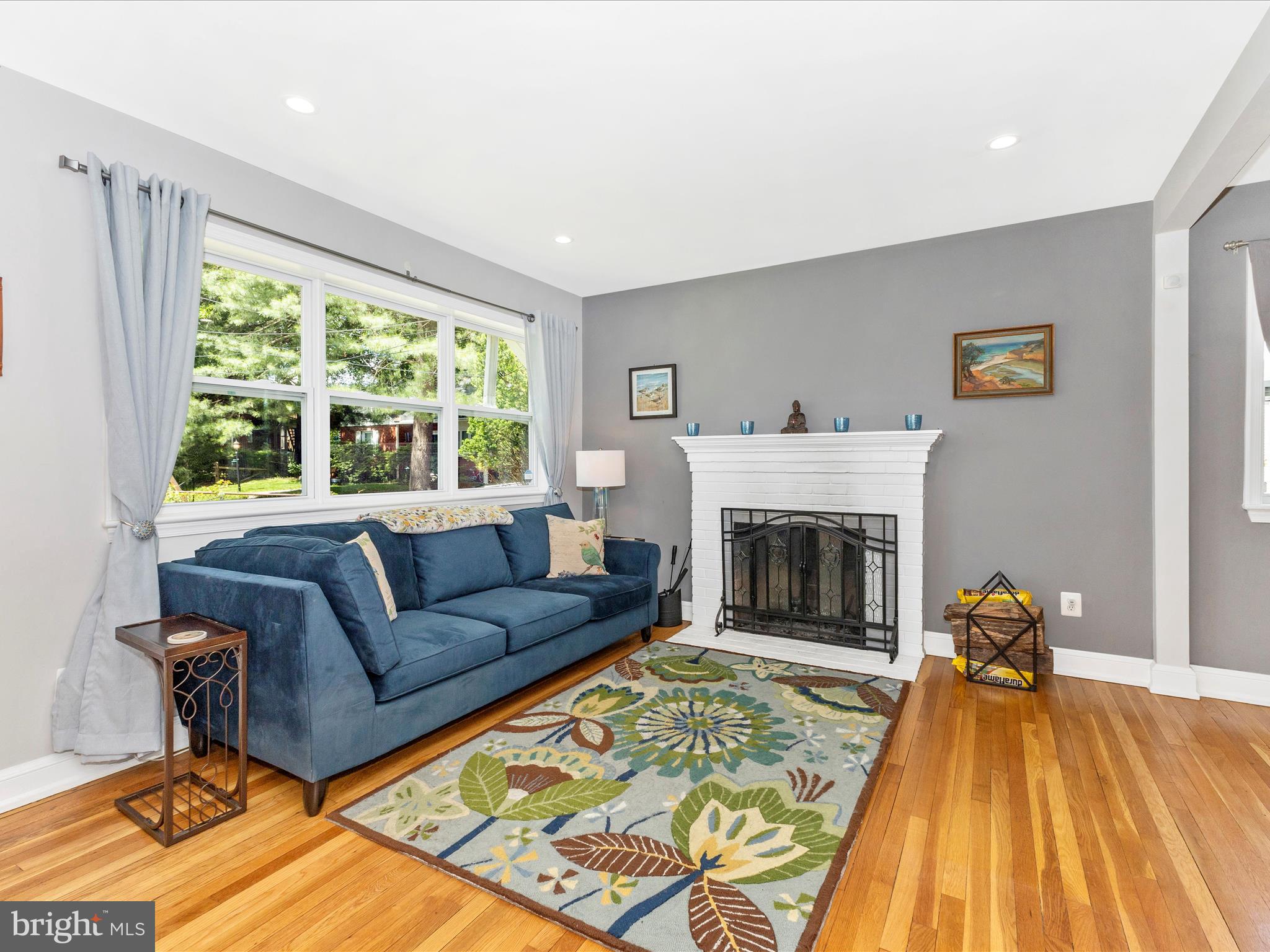 507 Kerwin Court Silver Spring, MD 20901 - Photo 4 of 51 a living room with furniture and a fireplace