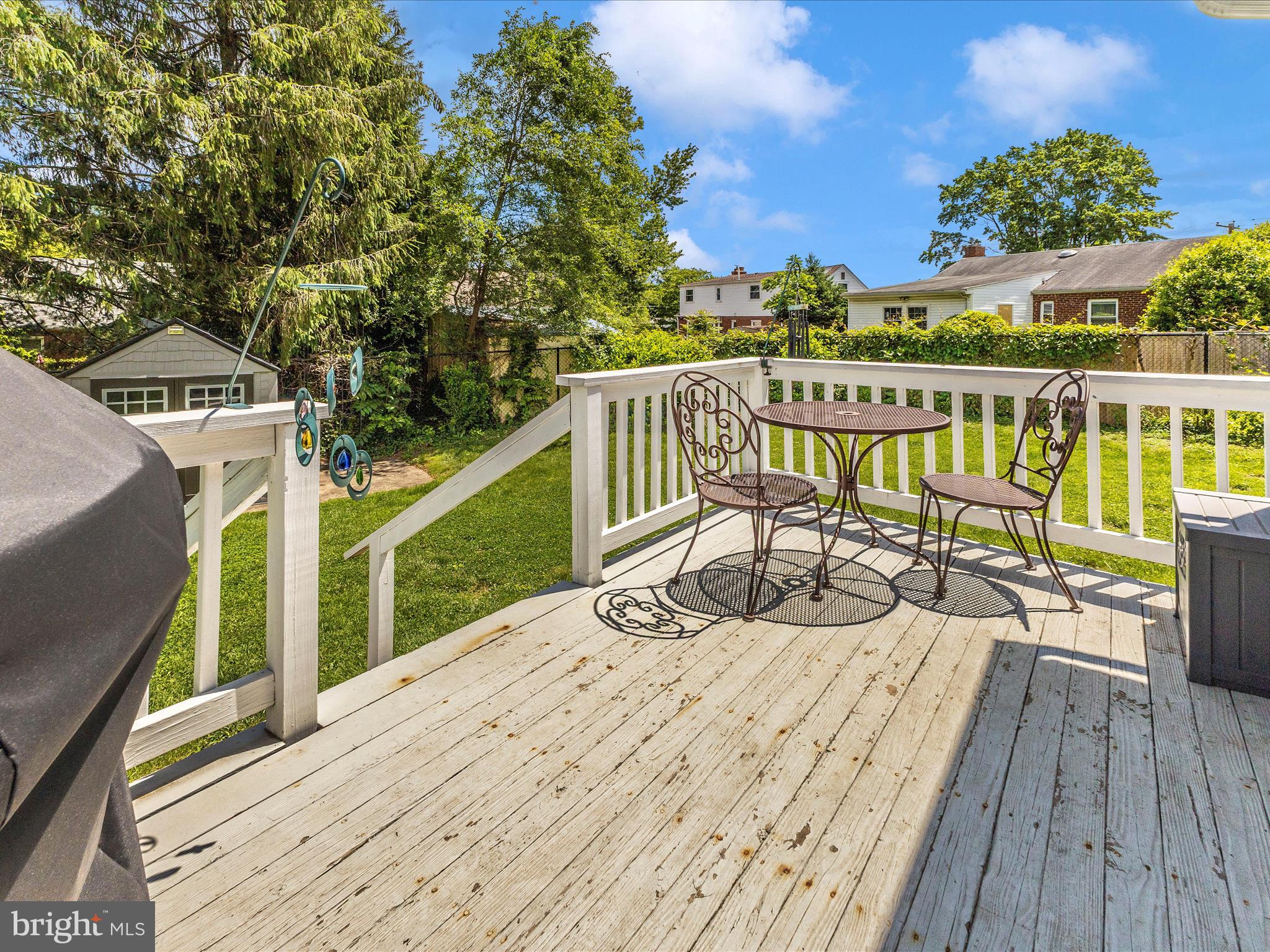 507 Kerwin Court Silver Spring, MD 20901 - Photo 48 of 51 a view of a balcony with two chairs and a table