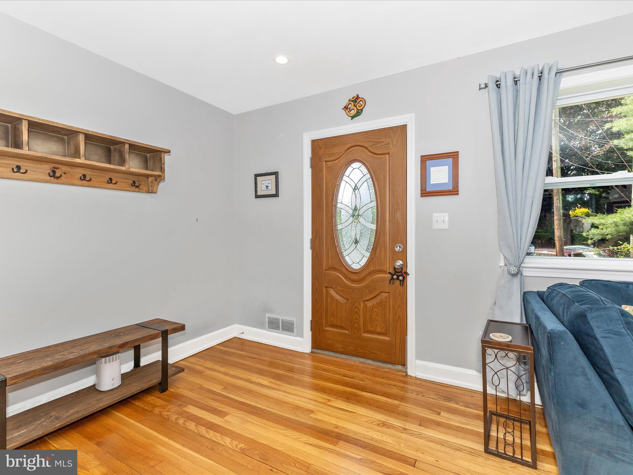 507 Kerwin Court Silver Spring, MD 20901 - Photo 6 of 51 a view of a room with wooden floor and windows