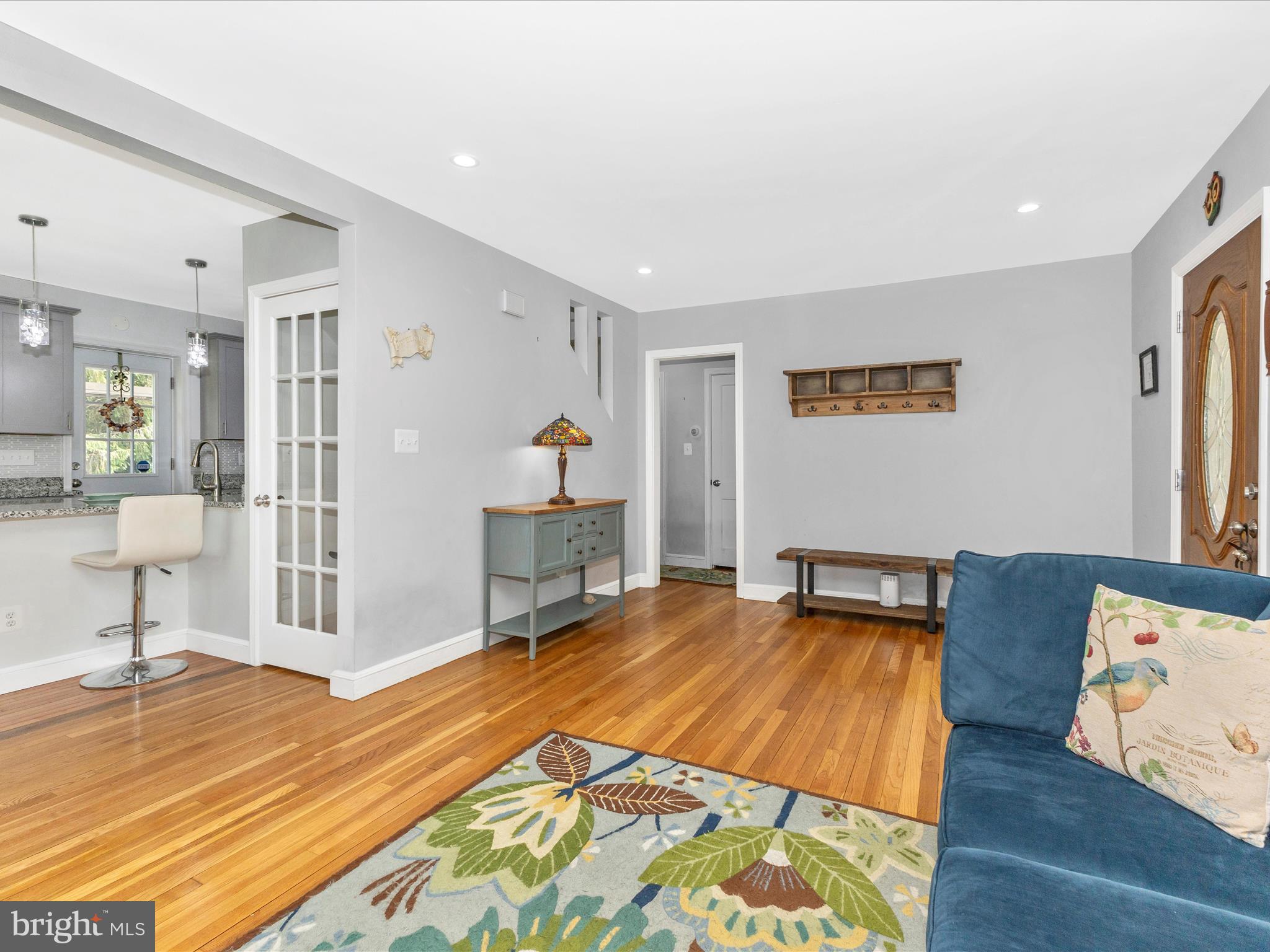 507 Kerwin Court Silver Spring, MD 20901 - Photo 8 of 51 a room with wooden floor and furniture