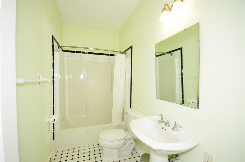 9 Breezy Point Road Acton, MA 01720 - Photo 19 of 37 a bathroom with a sink toilet and shower