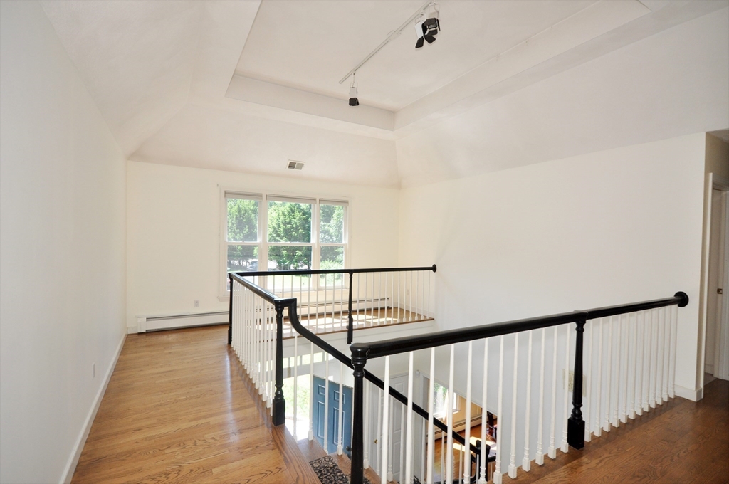 9 Breezy Point Road Acton, MA 01720 - Photo 20 of 37 a view of entryway with wooden floor
