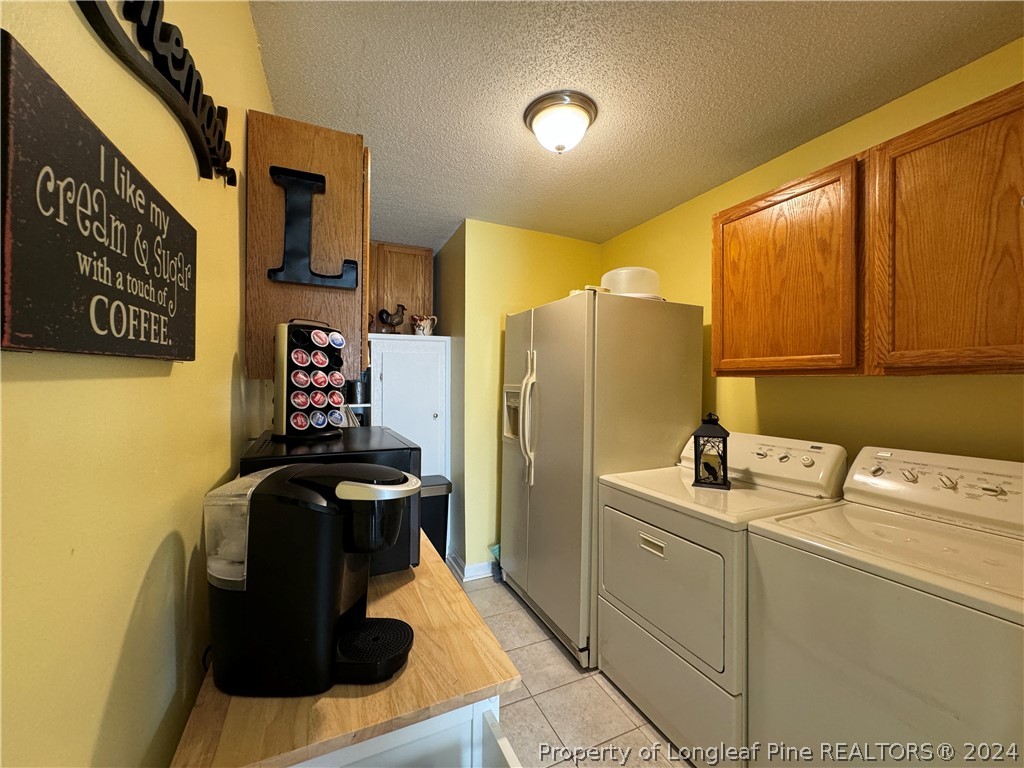 209 Old Farm Road Raeford, NC 28376 - Photo 23 of 45 a room with storage and utility