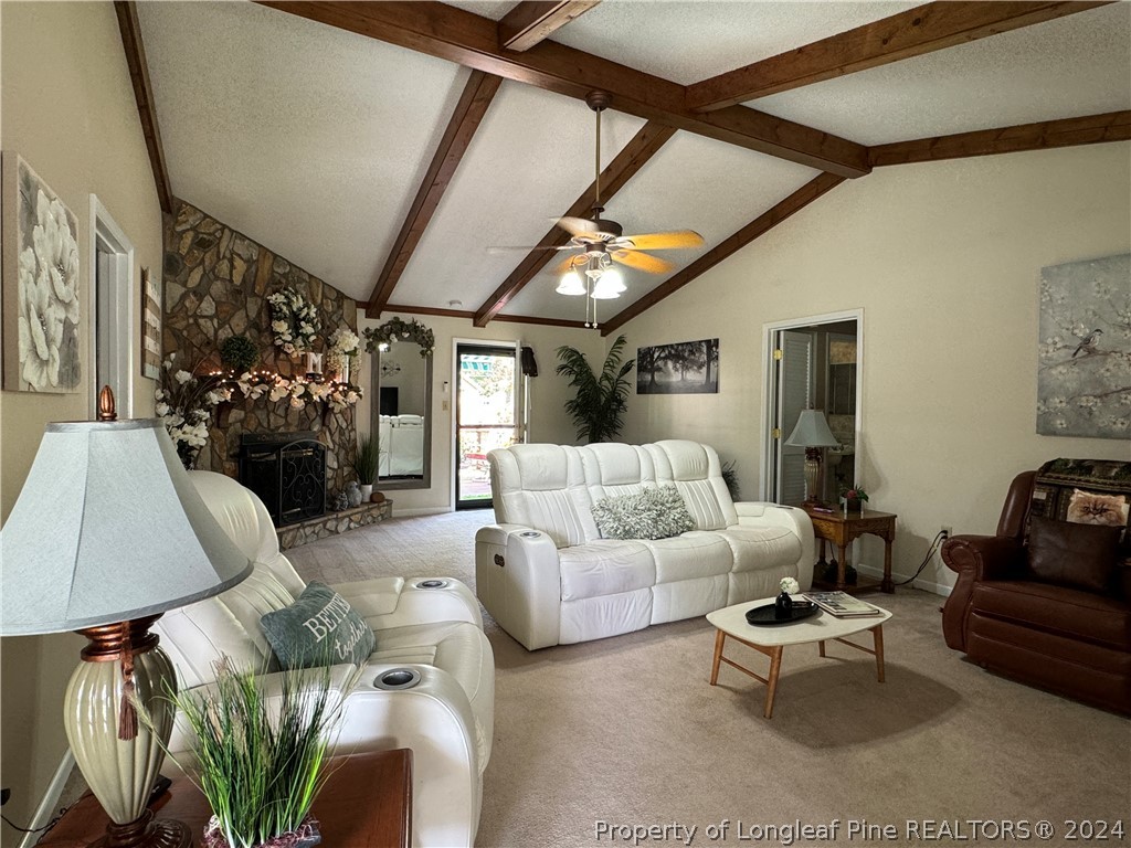 209 Old Farm Road Raeford, NC 28376 - Photo 10 of 45 a bedroom with furniture and a couch