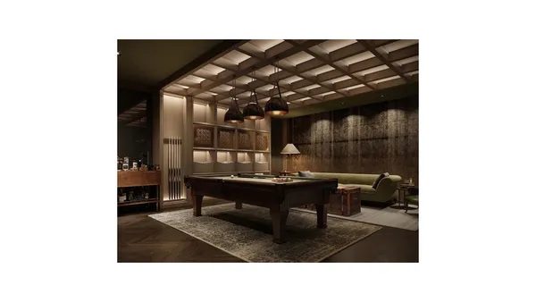 a living room with furniture and a piano