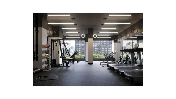 a room with lots of gym equipment