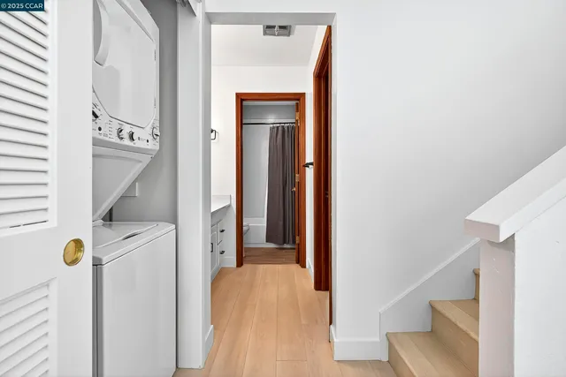 a view of a balcony with wooden floor