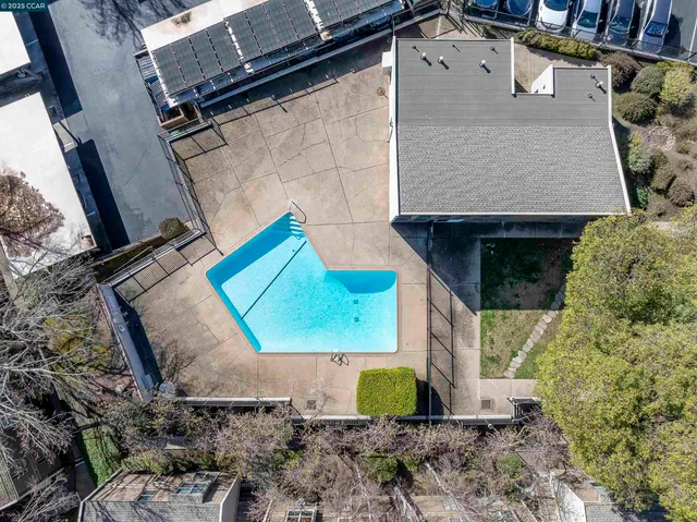 an aerial view of a house with a garden