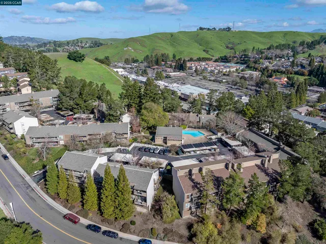 an aerial view of a city with lots of residential buildings
