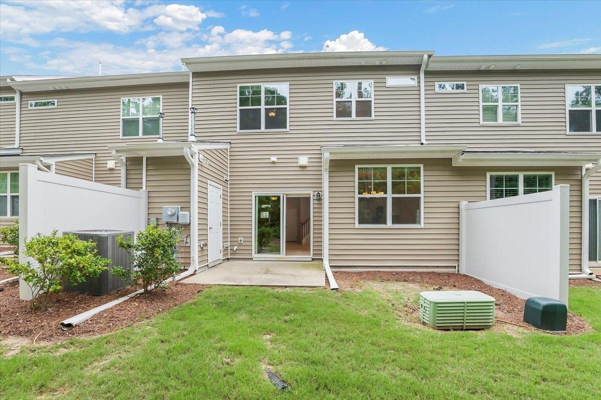 203 Zante Currant Road Durham, NC 27703 - Photo 23 of 28 There is even an outside storage closet which houses the electrical panel and WH. Back Patio