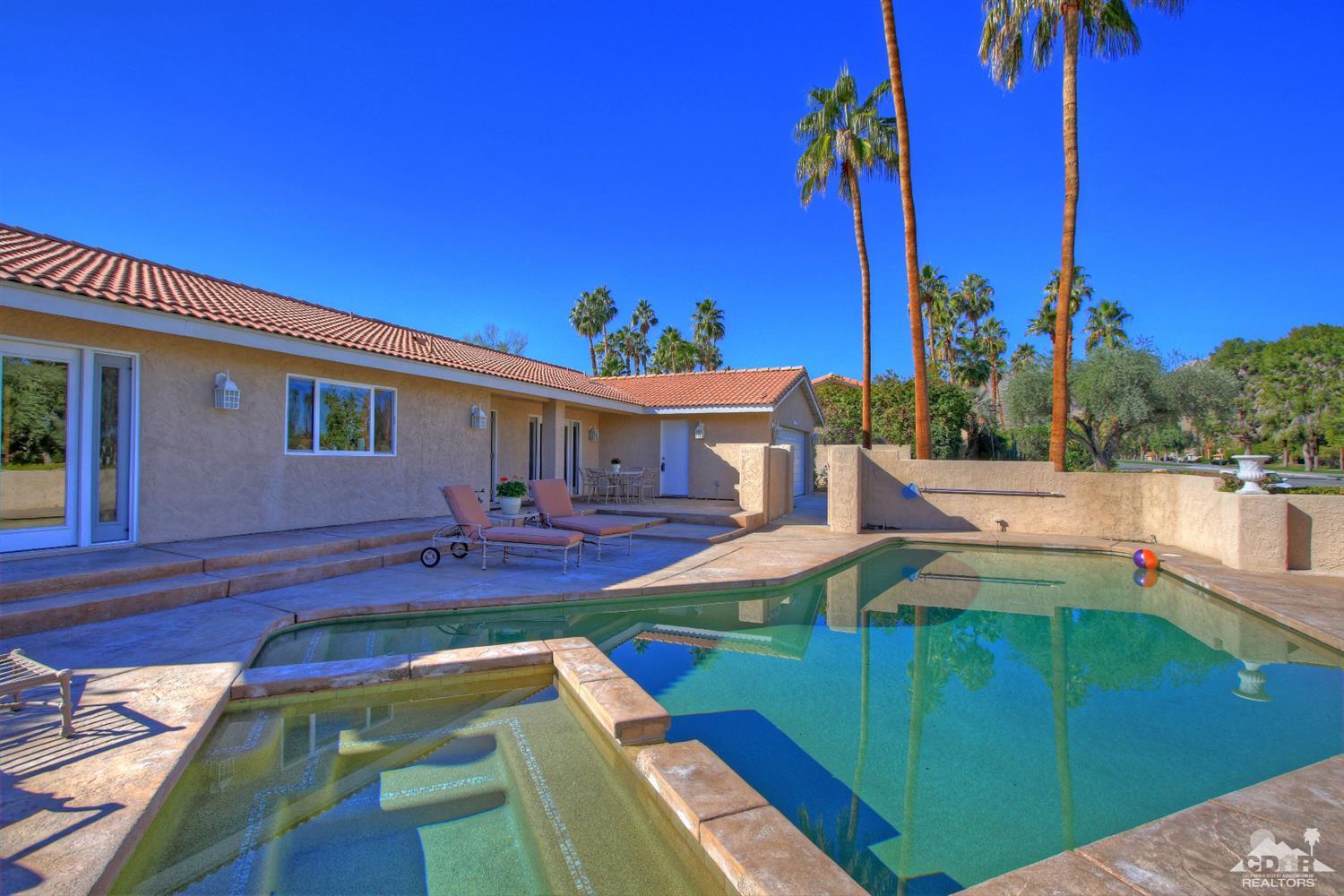 73443 Haystack Road Palm Desert, CA 92260 - Photo 54 of 59 a view of a house with swimming pool