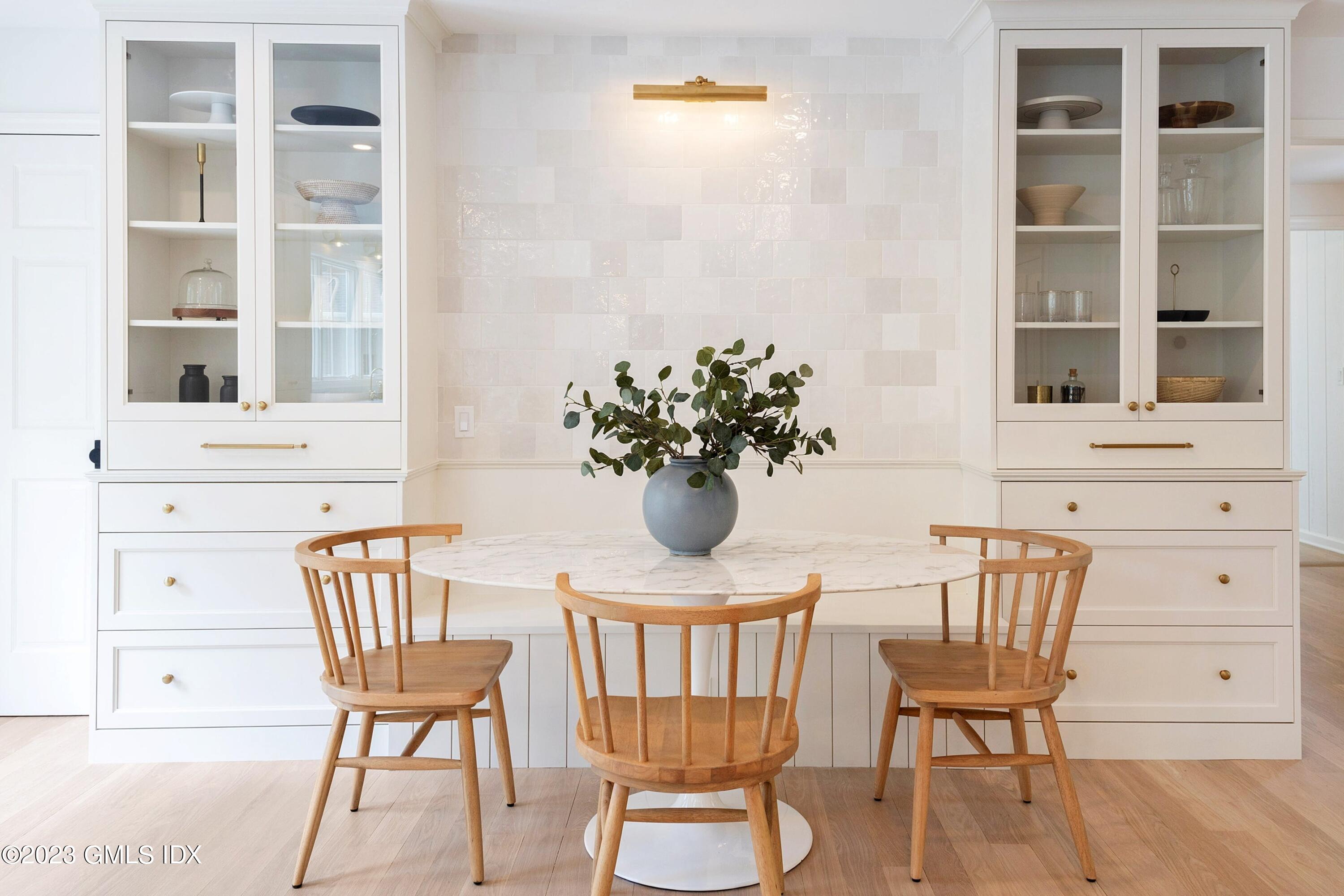 48 Old Mill Road Greenwich, CT 06831 - Photo 15 of 47 a view of a dining room with furniture and wooden floor