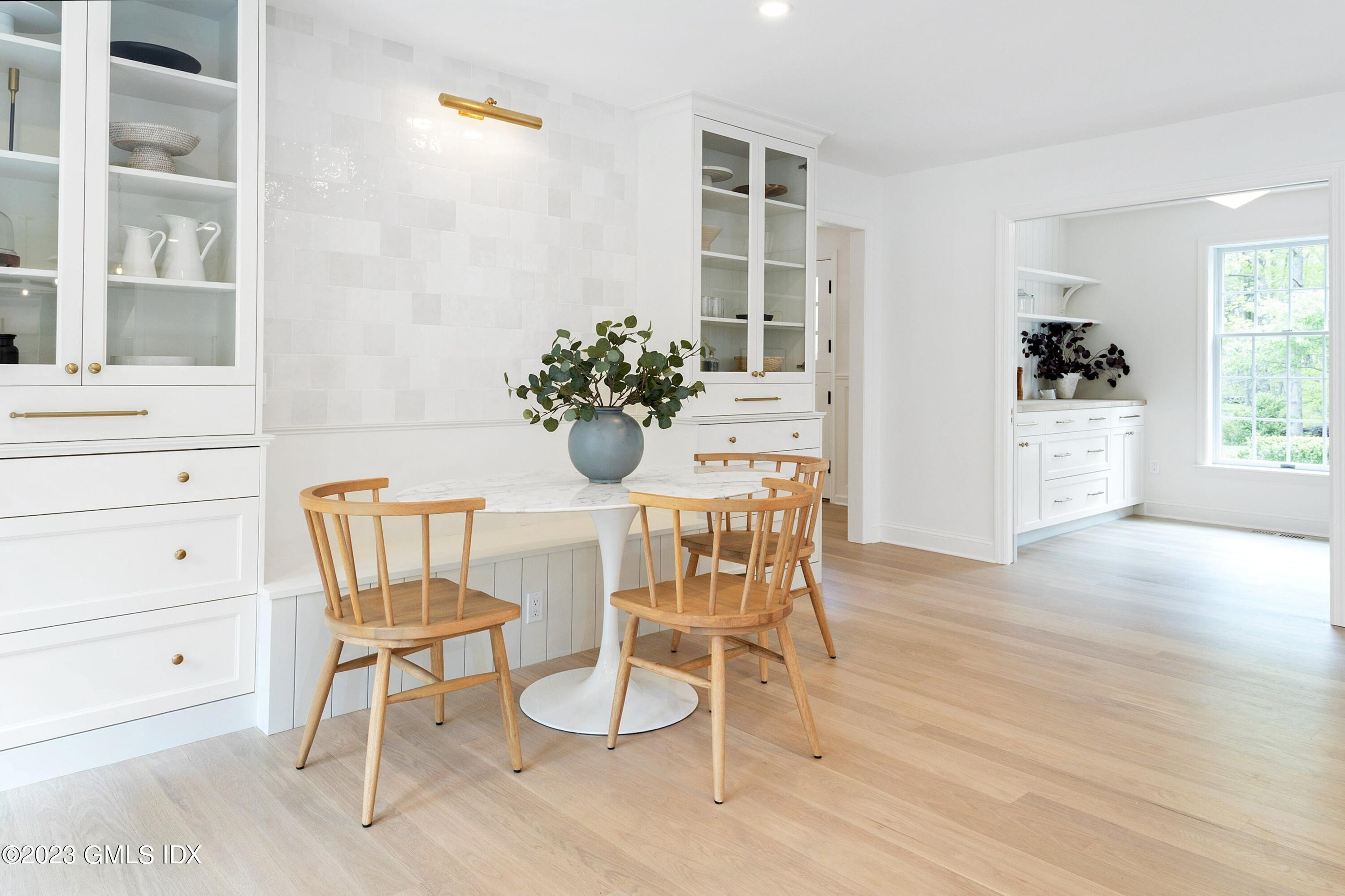 48 Old Mill Road Greenwich, CT 06831 - Photo 16 of 47 a dining room with furniture and window