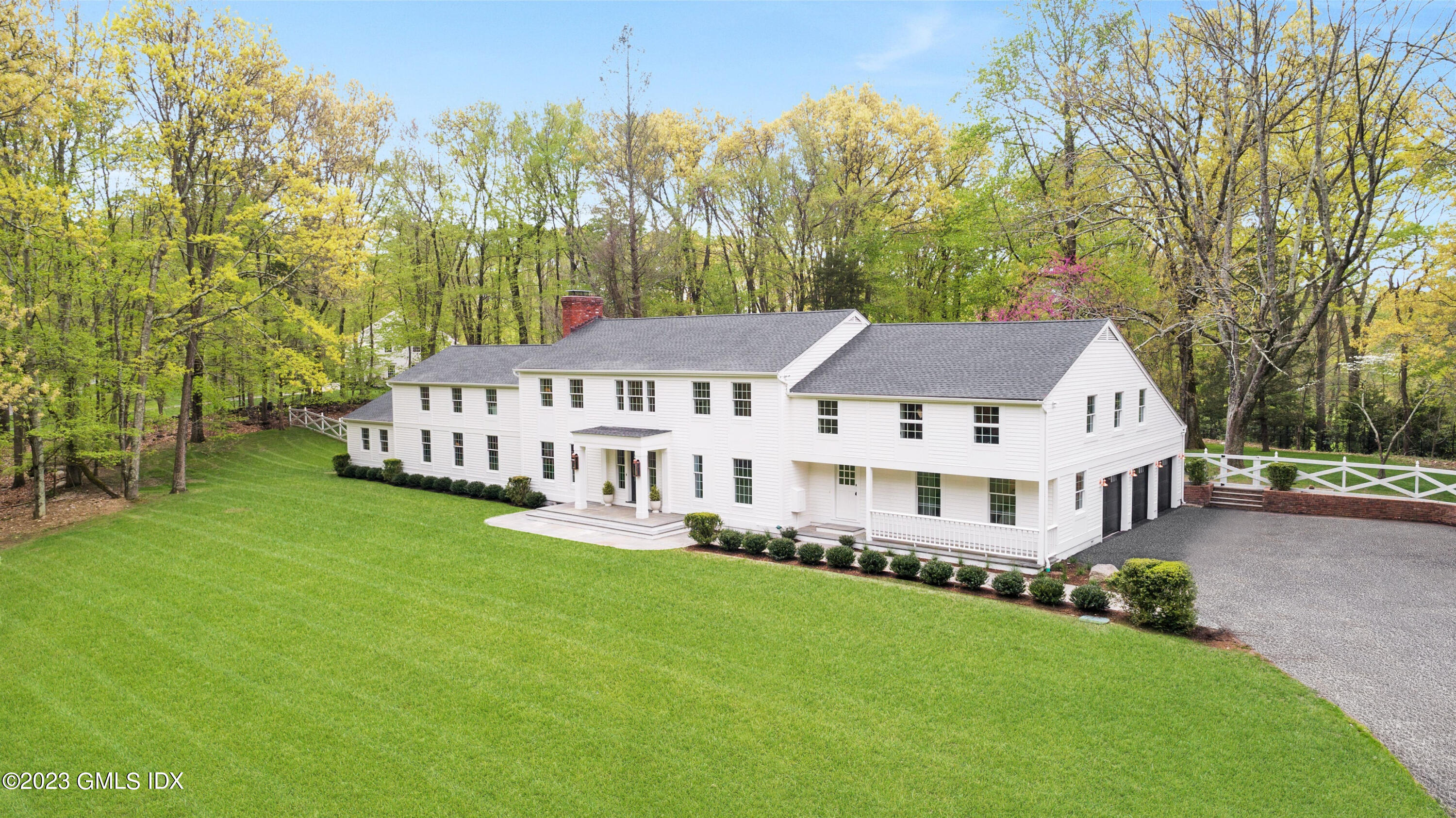 48 Old Mill Road Greenwich, CT 06831 - Photo 2 of 47 a view of a house with a big yard